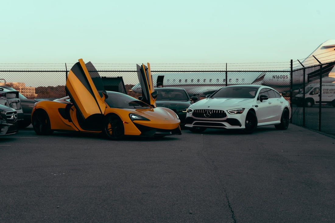 A group of cars parked next to each other in a parking lot