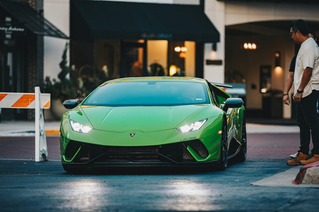 A bright green sports car parked on a street