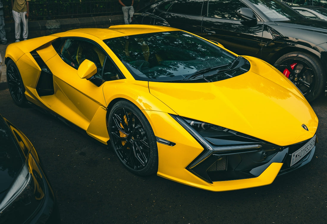 A bright yellow sports car parked outdoors
