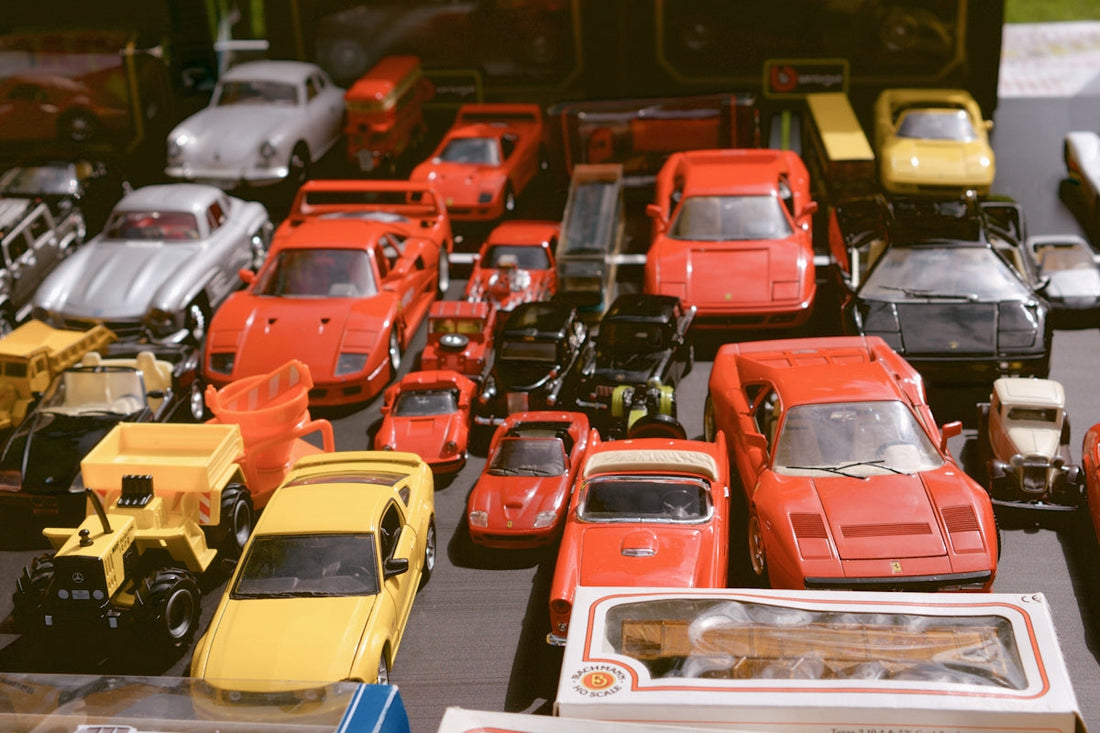 A collection of vintage toy cars on display.
