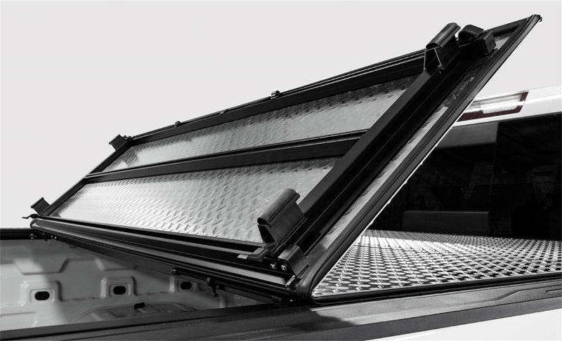Access LOMAX Tri-Fold Cover Black Urethane 19+ Dodge Ram - 5ft 7in Bed (Except Classic - w/ RamBox) B3040059