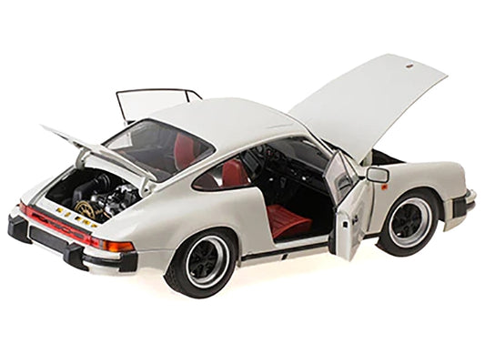 1983 Porsche 911 Carrera Coupe 3.2 White 1/18 Diecast Model Car - Premium Porsche Models from Minichamps - Just $246.59! Shop now at Rapidvehicles