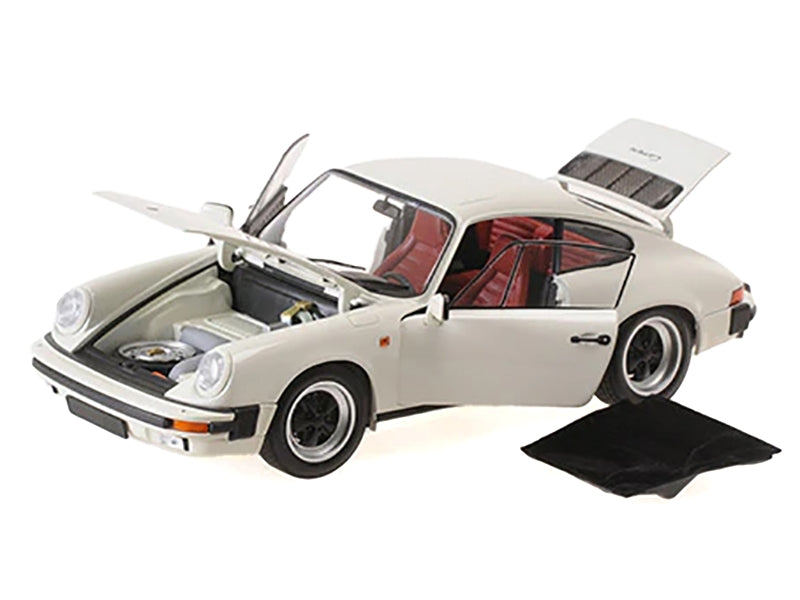 1983 Porsche 911 Carrera Coupe 3.2 White 1/18 Diecast Model Car - Premium Porsche Models from Minichamps - Just $246.59! Shop now at Rapidvehicles