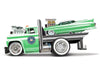 1966 Chevrolet C60 Flatbed Truck Green Metallic with White Top "Cadillac Service" and 1961 Cadillac Coupe Green Metallic with White Top "Muscle Transports" Series 1/64 Diecast Models by Muscle Machines - Premium  from Muscle Machines - Just $28.99! Shop now at Rapidvehicles