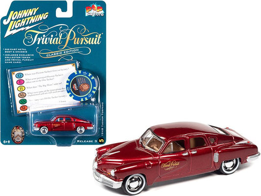 1948 Tucker Torpedo Red Maroon Metallic "Tucker: The Man and His Dream" (1988) Movie with Poker Chip (Collector Token) and Game Card "Trivial Pursuit" "Pop Culture" Series 3 1/64 Diecast Model Car by Johnny Lightning free shipping USA - Rapid Vehicles