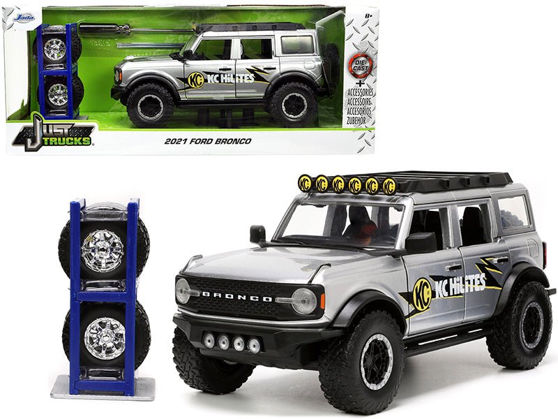 2021 Ford Bronco Gray Metallic "KC HiLiTES" with Extra Wheels "Just Trucks" Series 1/24 Diecast Model Car by Jada free shipping USA - Rapid Vehicles