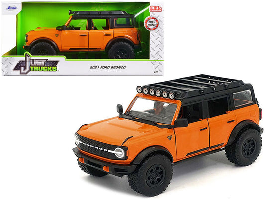 2021 Ford Bronco Orange with Black Stripes and Roof Rack "Just Trucks" Series 1/24 Diecast Model Car by Jada free shipping USA - Rapid Vehicles