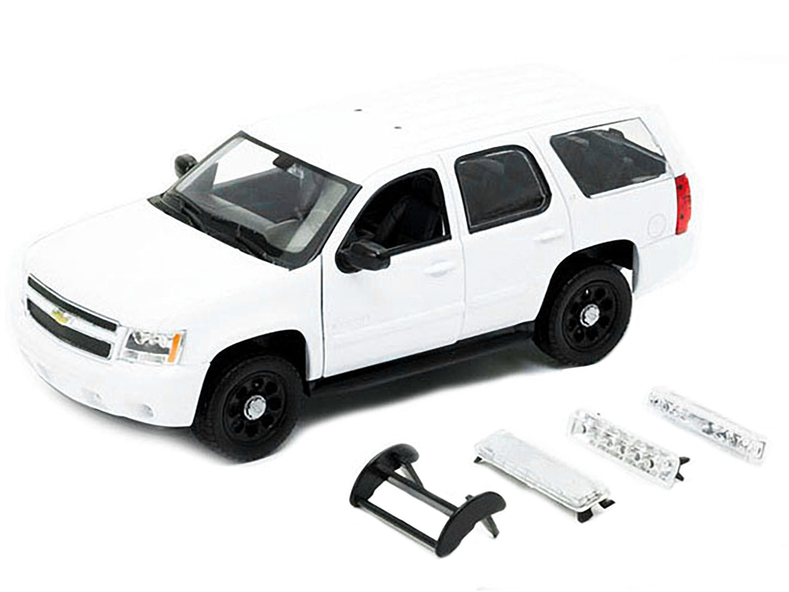 2008 Chevrolet Tahoe Unmarked Police Car White 1/24 Diecast Model - Premium Police Models from Welly - Just $44.56! Shop now at Rapidvehicles