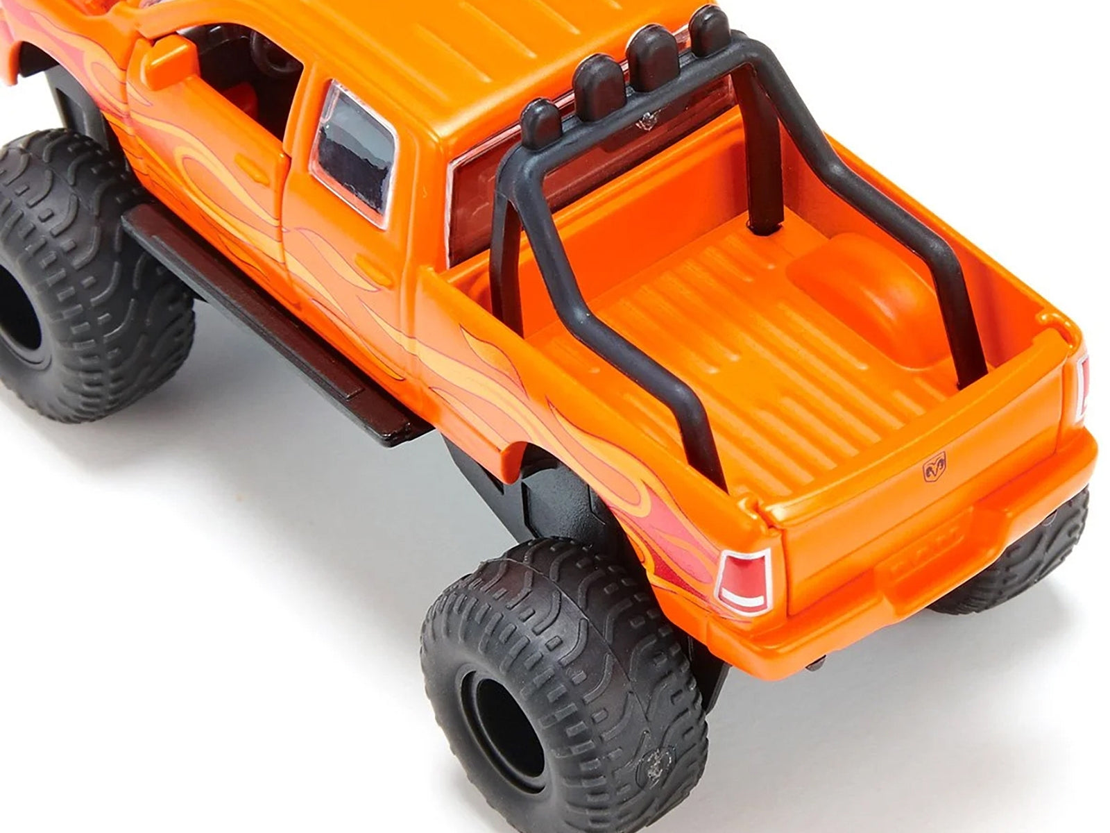 Ram 1500 Pickup Truck Lifted with Balloon Tires Orange with - Premium RAM Models from SIKU - Just $51.99! Shop now at Rapidvehicles