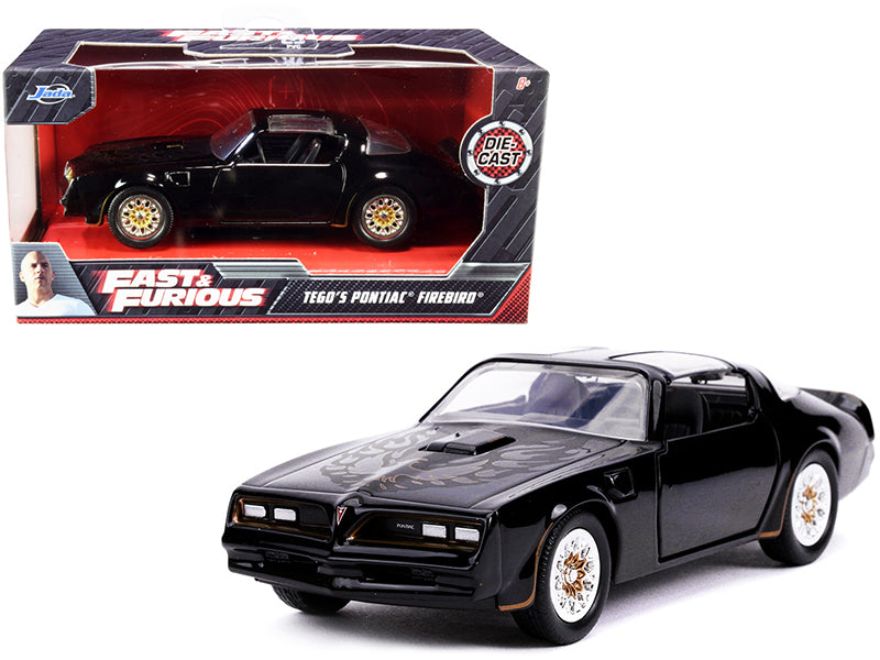 Tego's Pontiac Firebird Black with Gold Stripes and Hood Bird "Fast & Furious" Series 1/32 Diecast Model Car by Jada free shipping USA