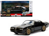 1977 Pontiac Firebird Black "Smokey and the Bandit" (1977) Movie "Hollywood Rides" Series 1/32 Diecast Model Car by Jada - Premium Pontiac Models from Jada - Just $24.99! Shop now at Rapidvehicles