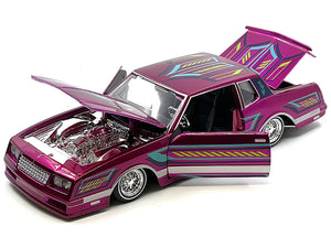 1986 Chevrolet Monte Carlo SS Lowrider Pink Metallic with Graphics "Lowriders" Series 1/24 Diecast Model Car by Maisto - Premium Chevrolet Models from Maisto - Just $57.18! Shop now at Rapidvehicles