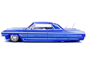 1964 Chevrolet Impala SS Lowrider Candy Blue with Graphics and White Interior "Lowriders" "Maisto Design" Series 1/26 Diecast Model Car by Maisto - Premium Chevrolet Models from Maisto - Just $47.59! Shop now at Rapidvehicles