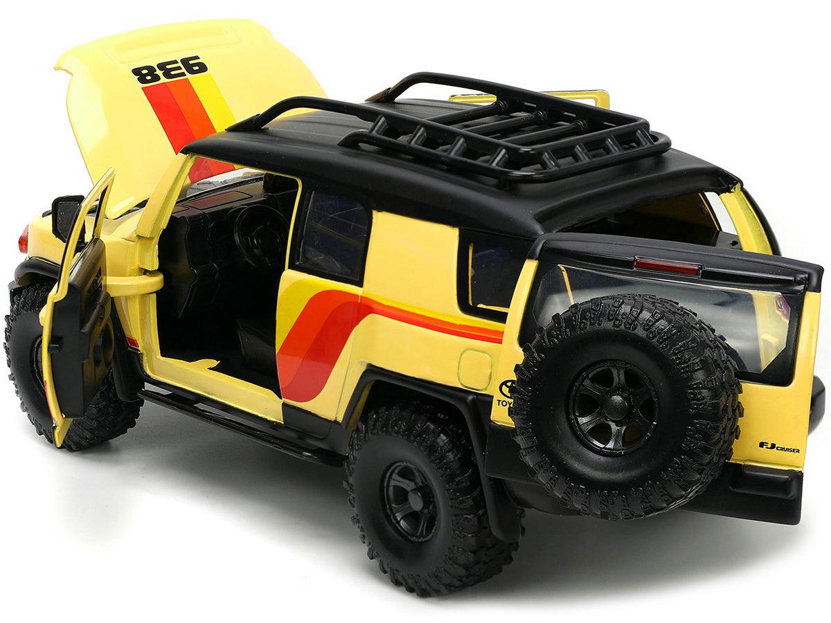 Toyota FJ Cruiser #938 Cream with Matt Black Top with Roof Rack and Stripes "KC Hilites" with Extra Wheels "Just Trucks" Series 1/24 Diecast Model Car by Jada - Premium Toyota Models from Jada - Just $55.09! Shop now at Rapidvehicles