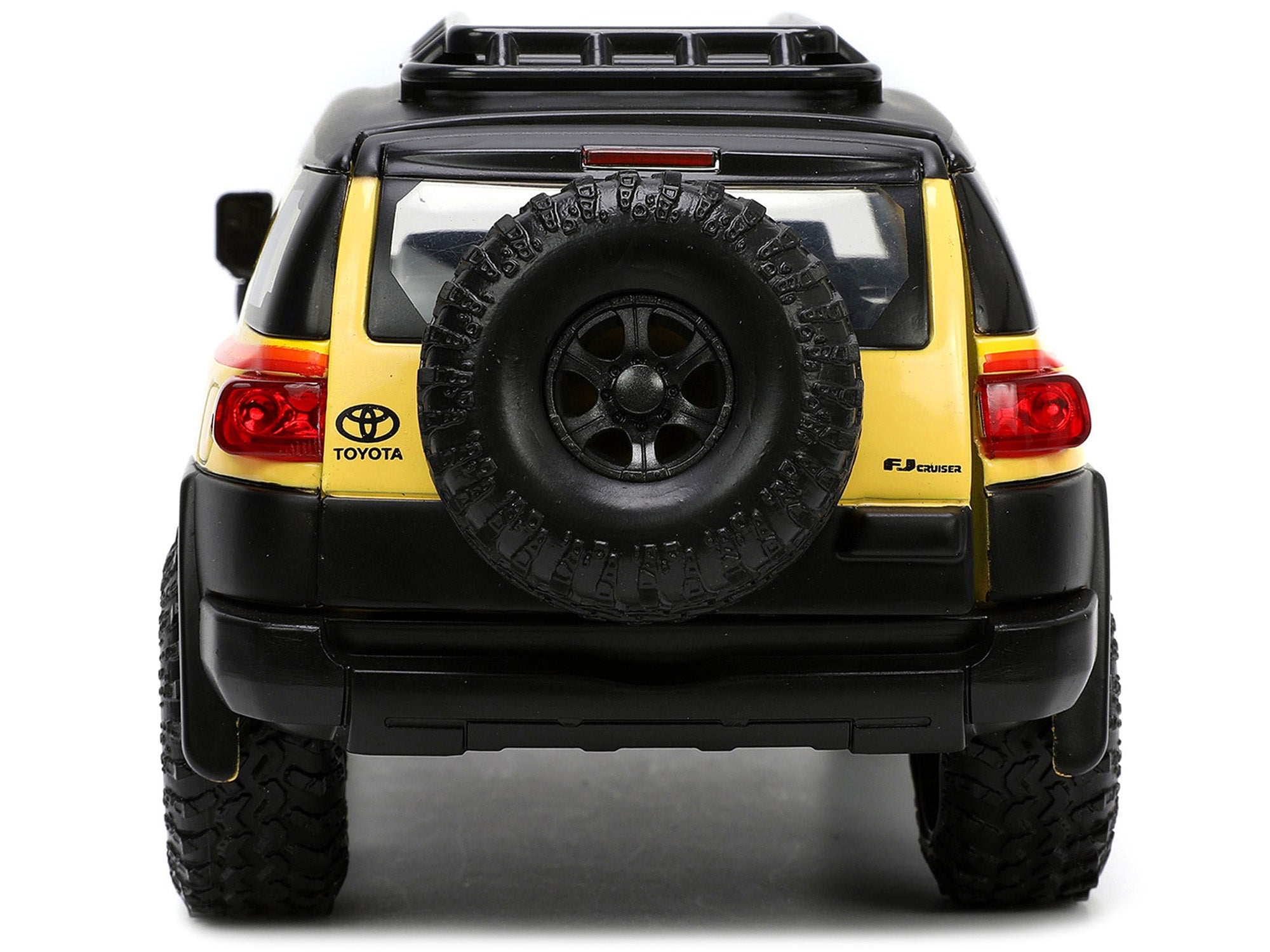 Toyota FJ Cruiser #938 Cream with Matt Black Top with Roof Rack and Stripes "KC Hilites" with Extra Wheels "Just Trucks" Series 1/24 Diecast Model Car by Jada - Premium Toyota Models from Jada - Just $55.09! Shop now at Rapidvehicles