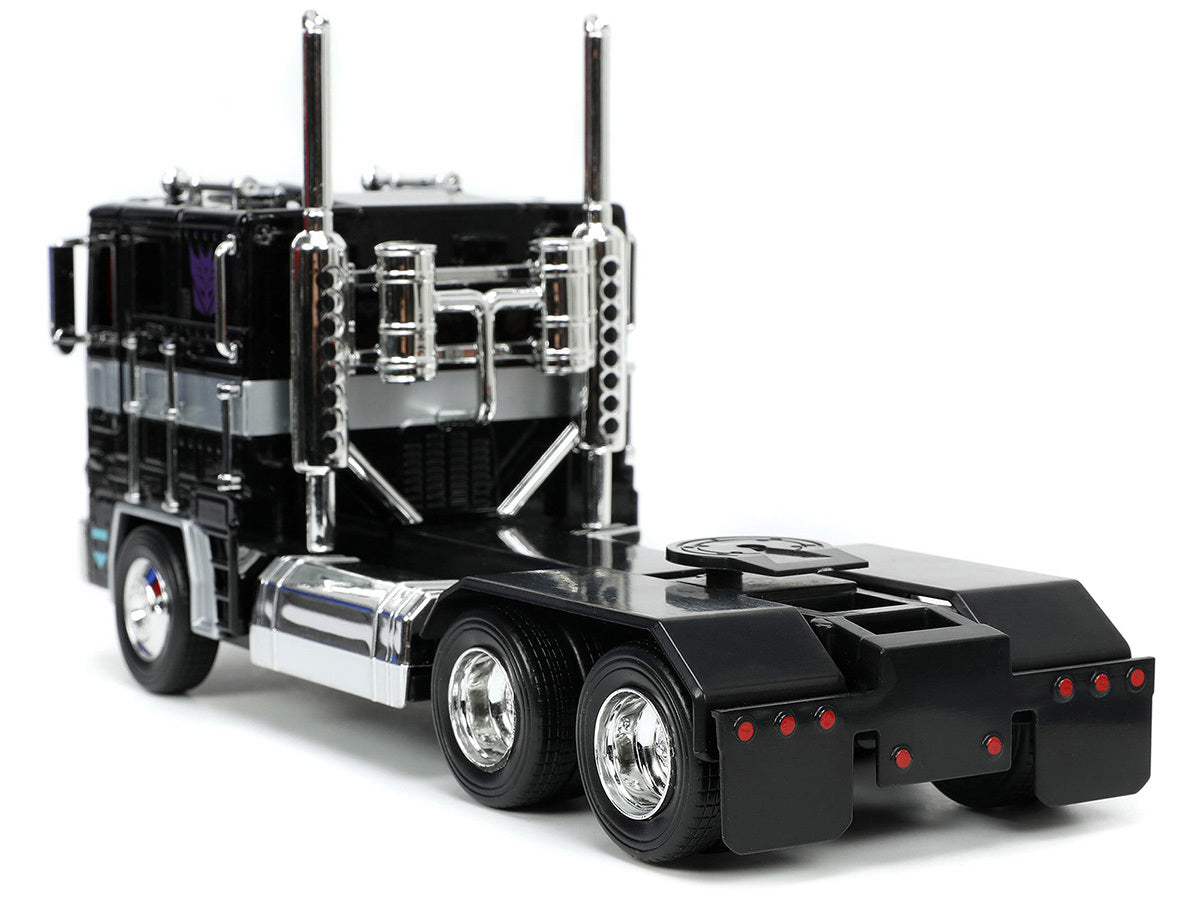 Decepticon Nemesis Prime with Robot on Chassis "Transformers" TV Series "Hollywood Rides" Series 1/24 Diecast Model by Jada - Premium Movie/TV Series Models from Jada - Just $62.79! Shop now at Rapidvehicles