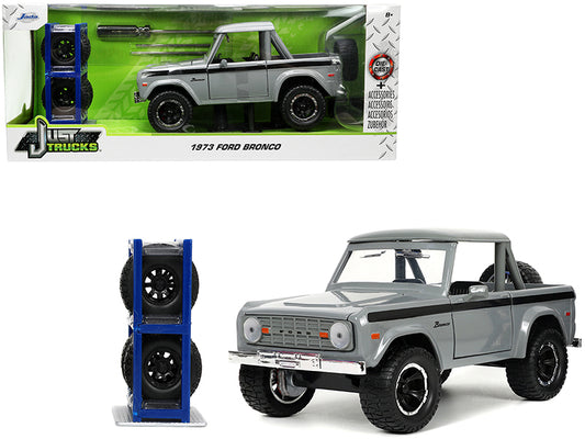 1973 Ford Bronco Pickup Truck Gray with Black Stripes with Extra Wheels "Just Trucks" Series 1/24 Diecast Model Car by Jada free shipping USA