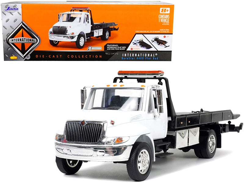 International DuraStar 4400 Flatbed Tow Truck White 1/24 Diecast - Premium Tow Trucks Models from Jada - Just $75.59! Shop now at Rapidvehicles