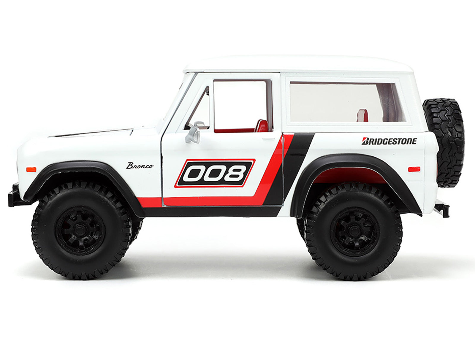 1973 Ford Bronco #008 White with Red and Black Stripes and Red Interior with Extra Wheels "Just Trucks" Series 1/24 Diecast Model Car by Jada - Premium Ford Models from Jada - Just $55.09! Shop now at Rapidvehicles