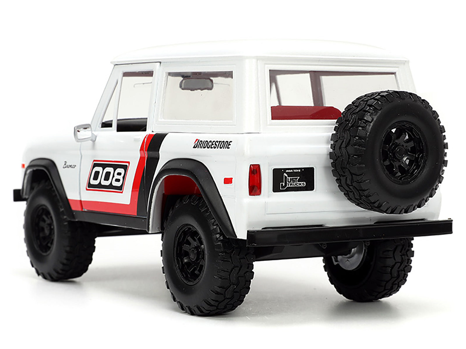 1973 Ford Bronco #008 White with Red and Black Stripes and Red Interior with Extra Wheels "Just Trucks" Series 1/24 Diecast Model Car by Jada - Premium Ford Models from Jada - Just $55.09! Shop now at Rapidvehicles