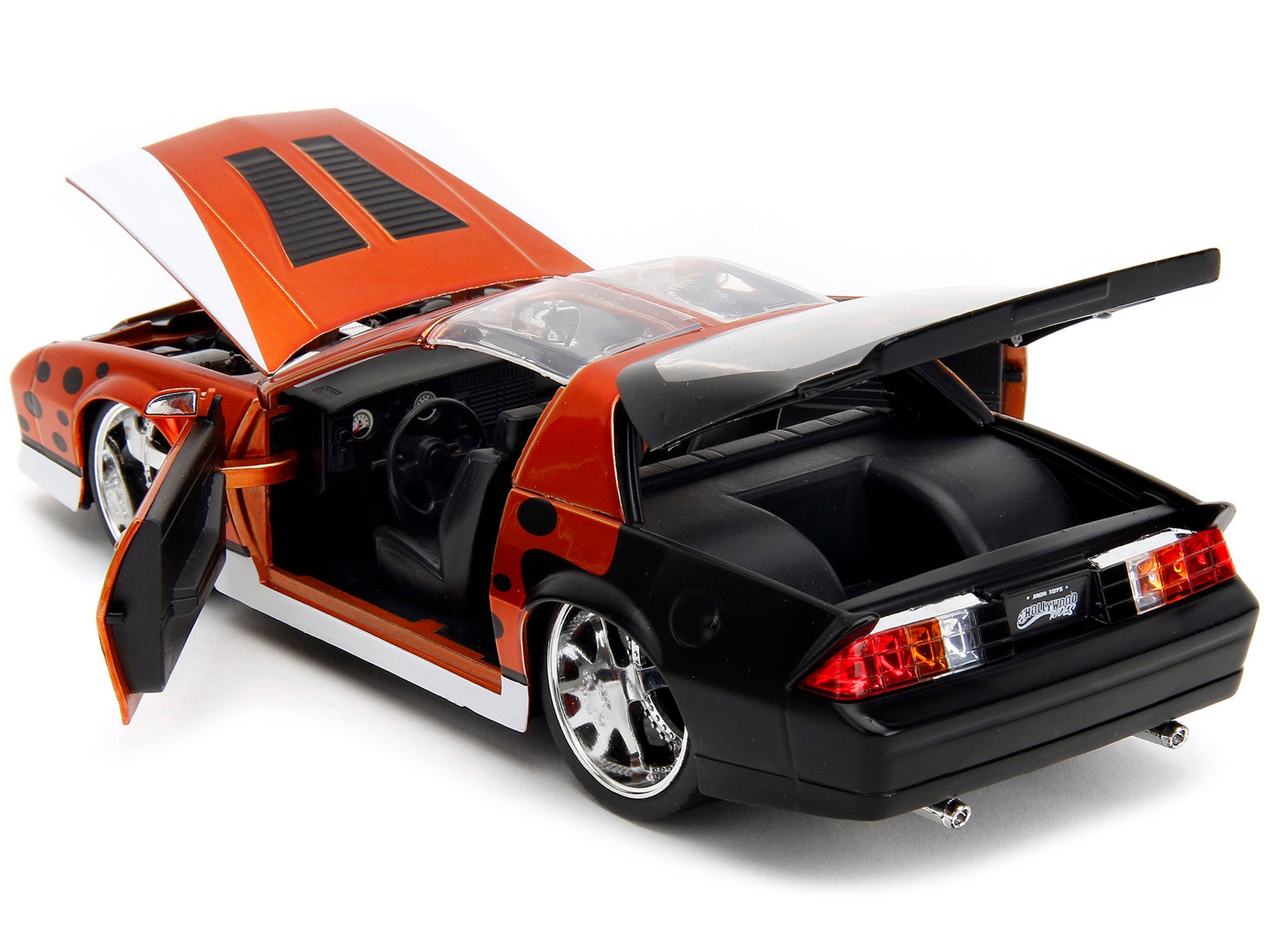 1985 Chevrolet Camaro Z/28 Orange Metallic with Graphics and - Premium Chevrolet Models from Jada - Just $64.79! Shop now at Rapidvehicles