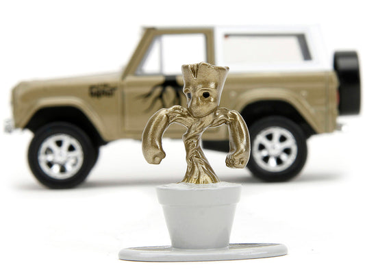 1973 Ford Bronco Gold Metallic with White Top and Groot Diecast - Premium Movie/TV Series Models from Jada - Just $32.39! Shop now at Rapidvehicles