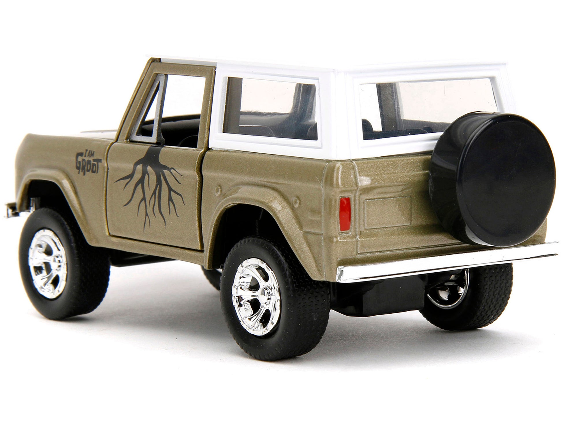 1973 Ford Bronco Gold Metallic with White Top and Groot Diecast - Premium Movie/TV Series Models from Jada - Just $32.39! Shop now at Rapidvehicles