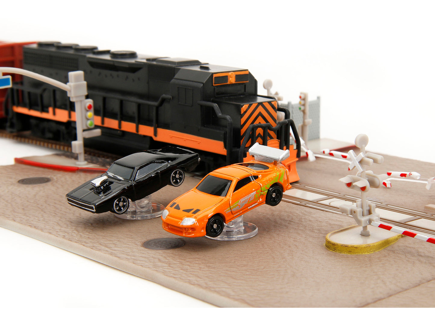 "Fast & Furious" Final Race Diorama with Toyota Supra Orange and