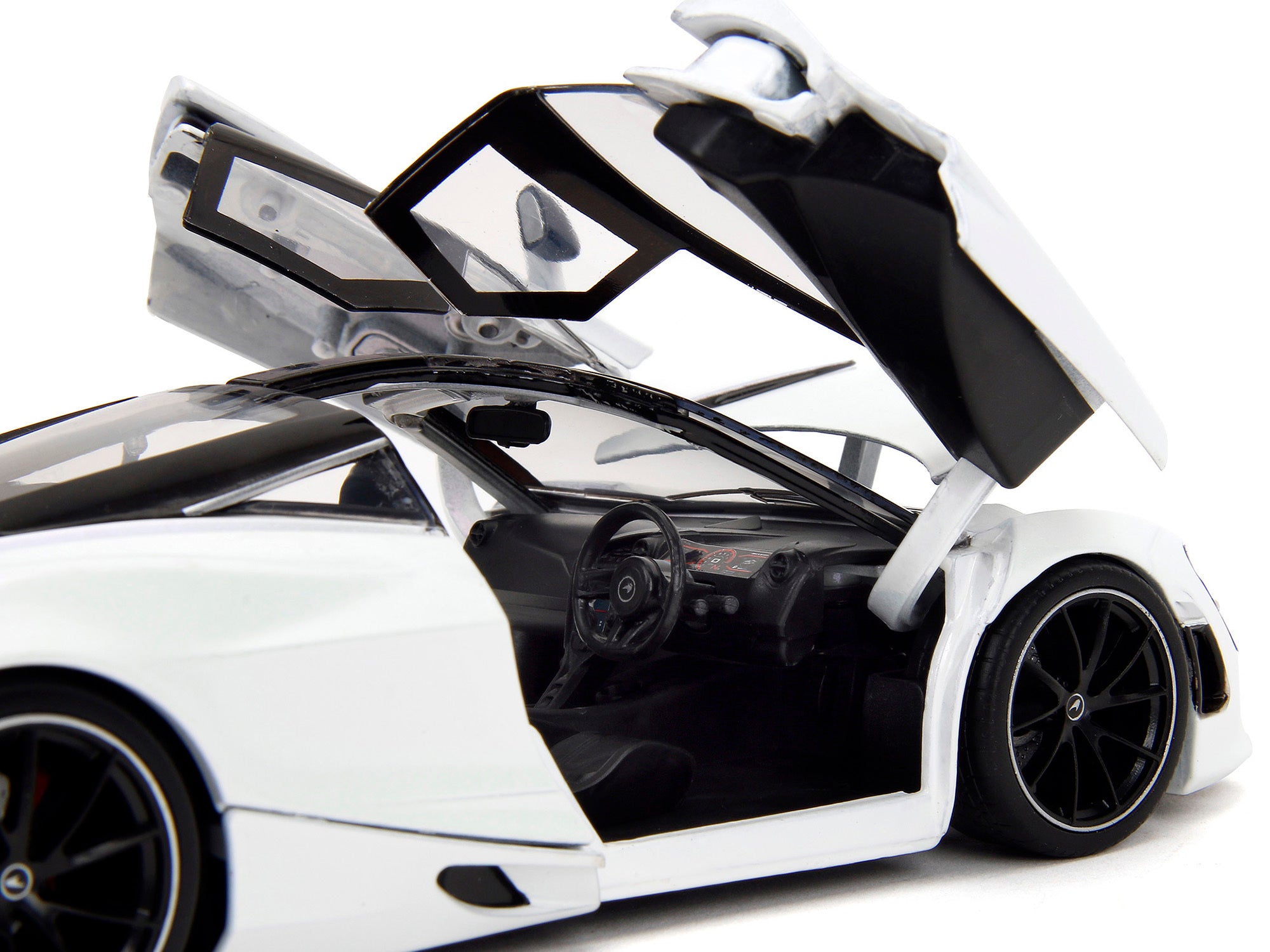 McLaren 720S White Metallic with Black Top "Pink Slips" Series 1/24 Diecast Model Car by Jada - Premium McLaren Models from Jada - Just $40.99! Shop now at Rapidvehicles