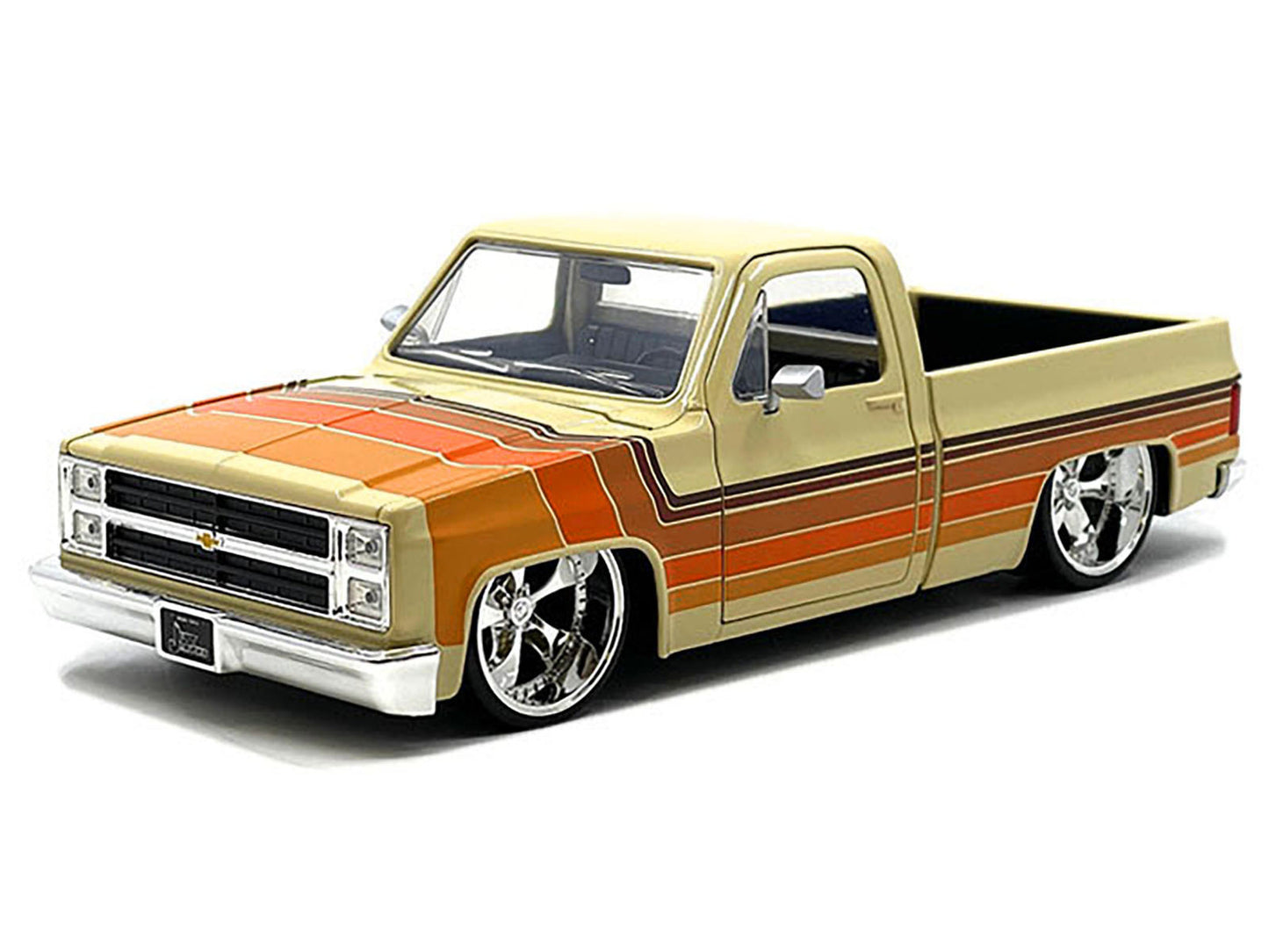 1985 Chevrolet C-10 Pickup Truck Beige with Stripes and Cartelli - Premium Pickup Trucks Models from Jada - Just $62.99! Shop now at Rapidvehicles