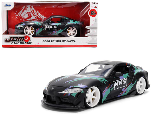 2020 Toyota GR Supra "HKS" Matt Black with Graphics "JDM Tuners" Series 1/24 Diecast Model Car by Jada - Use code SHOPAPP15 to get 15 percent off