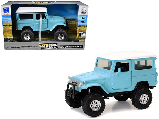 Toyota Land Cruiser FJ40 Light Blue with White Top "Xtreme Off-Road" Series 1/24 Diecast Model by New Ray - Use code SHOPAPP15 to get 15 percent off