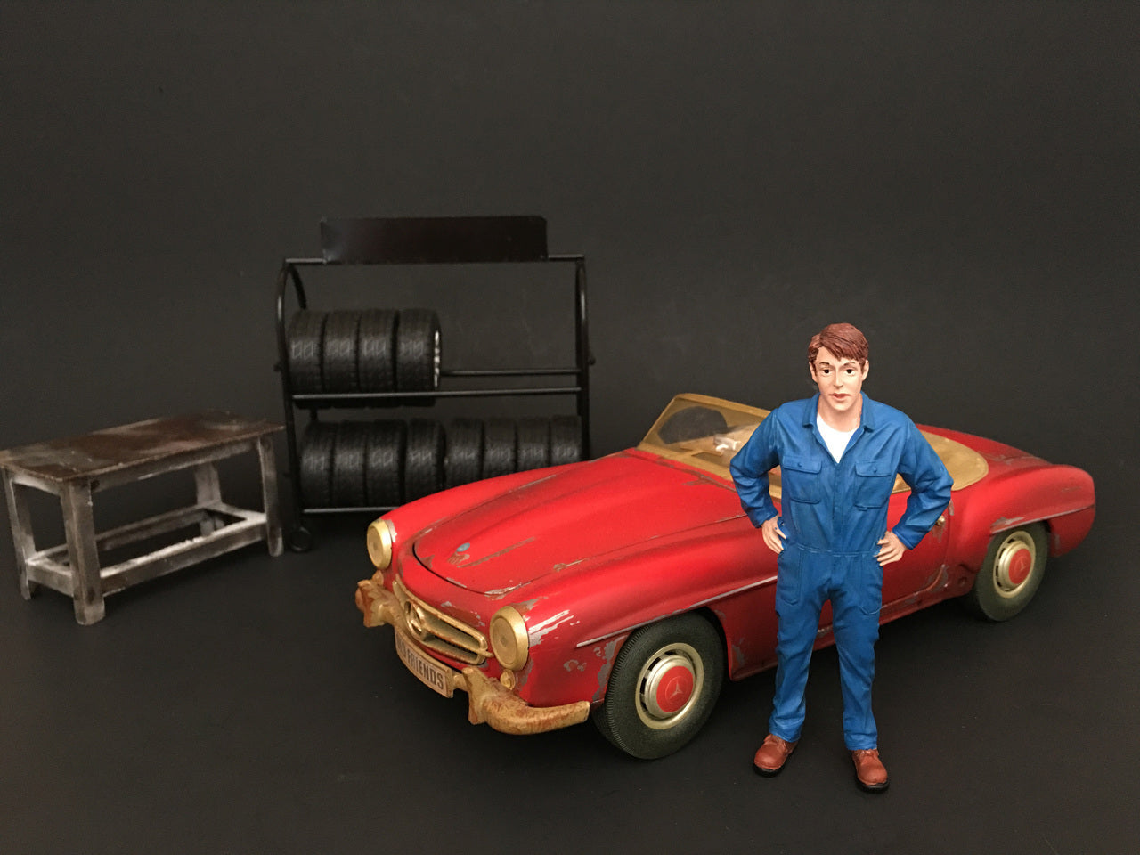 Mechanic John Inspecting Figurine for 1/18 Scale Models by American Diorama - Premium Figures from American Diorama - Just $24.99! Shop now at Rapidvehicles