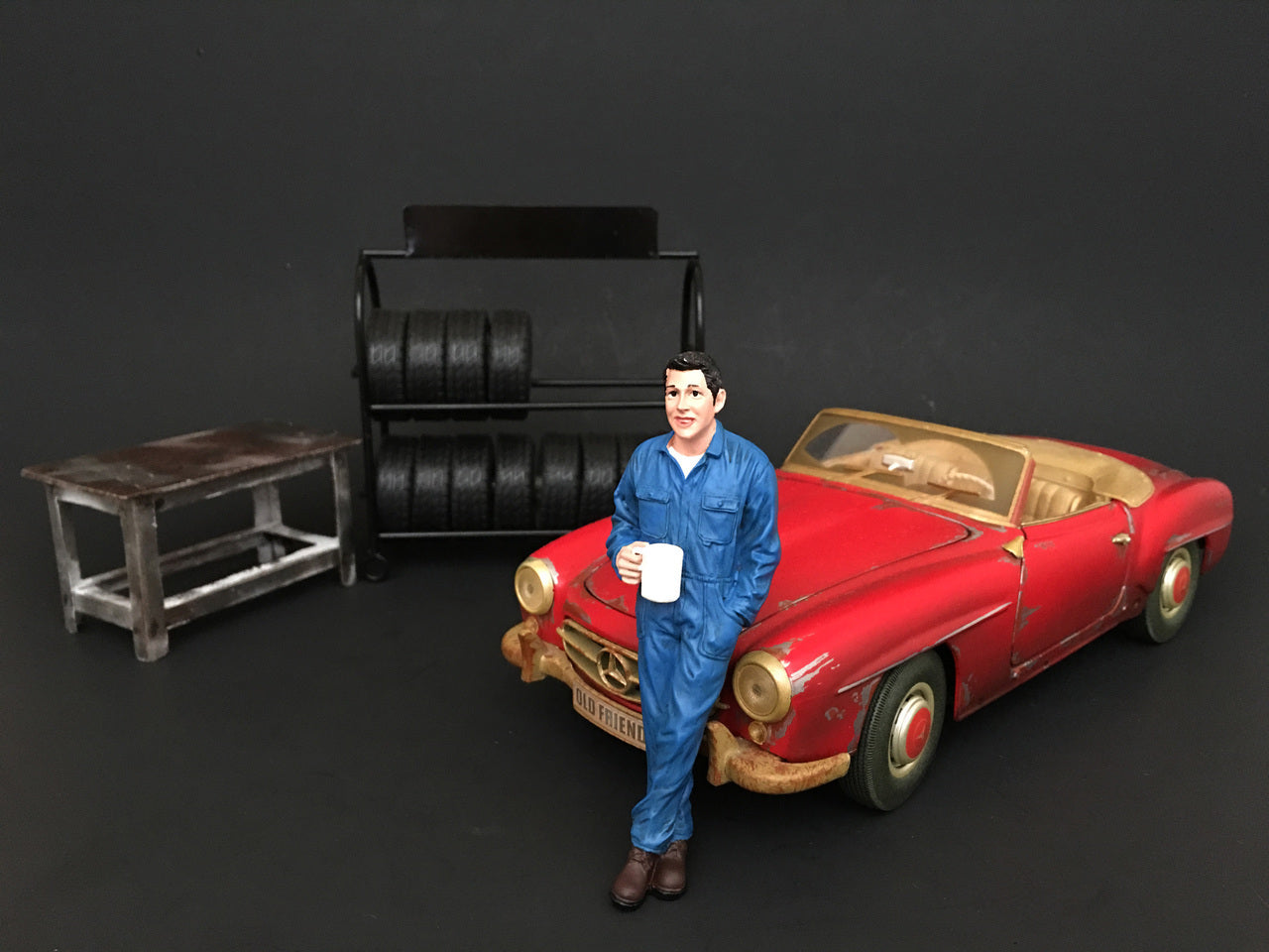 Mechanic Larry Taking Break Figure For 1:18 Scale Models by American Diorama - Premium Figures from American Diorama - Just $24.99! Shop now at Rapidvehicles