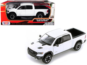 2019 RAM 1500 Rebel Crew Cab Pickup Truck White 1/24-1/27 Diecast Model Car by Motormax - Premium RAM Models from Motormax - Just $54.76! Shop now at Rapidvehicles