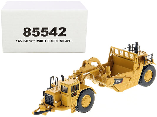 CAT Caterpillar 657G Wheeled Scraper Tractor "High Line" Series - Premium Construction Models from Diecast Masters - Just $67.49! Shop now at Rapidvehicles