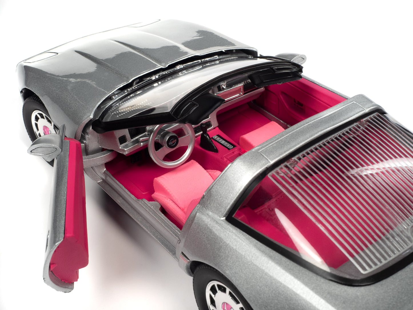 1986 Chevrolet Corvette Convertible Silver Metallic with Pink - Premium Corvette Models from Autoworld - Just $173.99! Shop now at Rapidvehicles