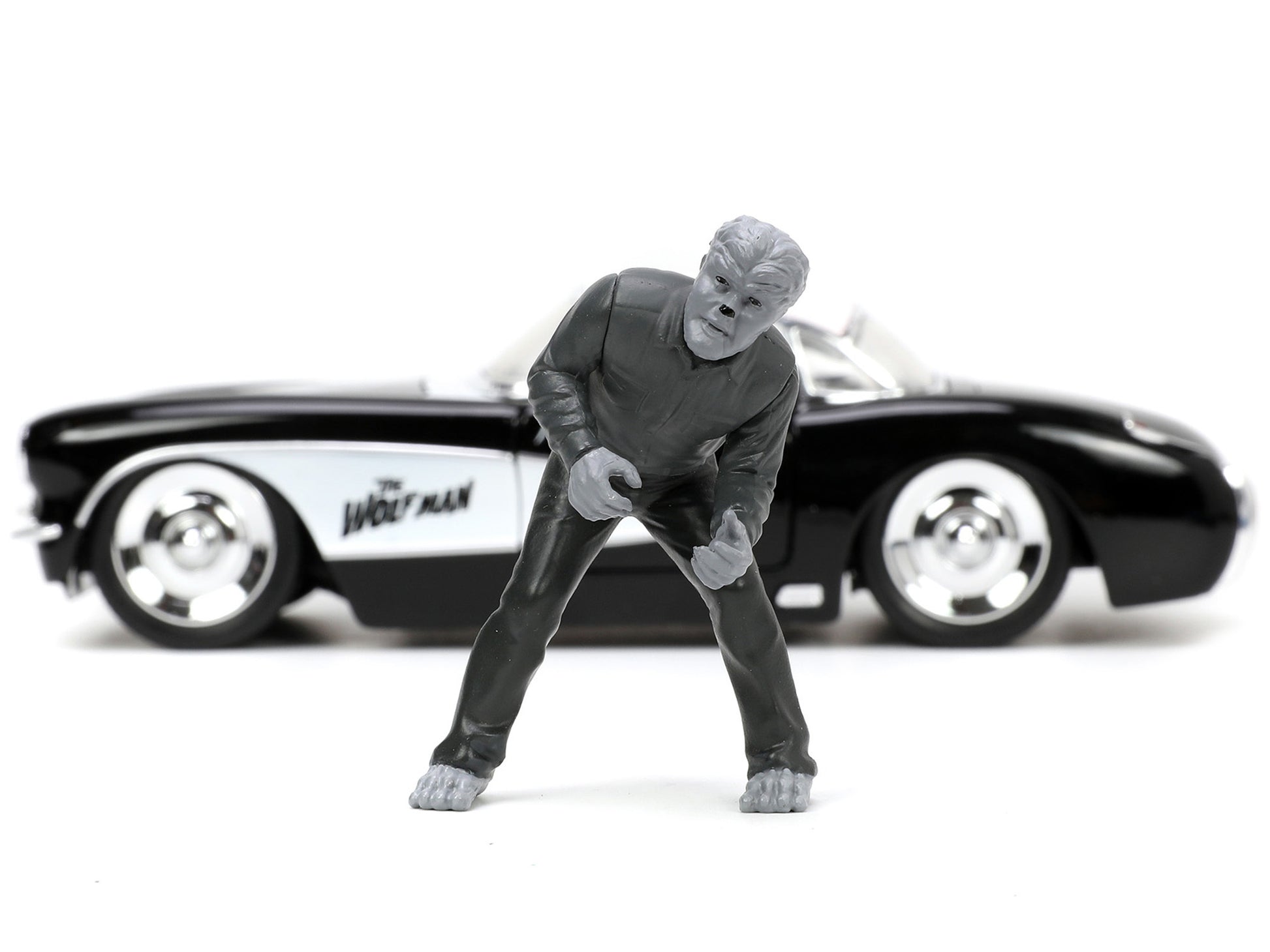 1957 Chevrolet Corvette Black with White Top and Wolfman Diecast - Premium Corvette Models from Jada - Just $71.99! Shop now at Rapidvehicles