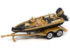 1980 Chevrolet Monte Carlo Light Camel Gold Metallic with Bass Boat and Trailer Limited Edition to 7264 pieces Worldwide "Tow & Go" Series 1/64 Diecast Model Car by Johnny Lightning - Premium 1/64 Scale Sets from Johnny Lightning - Just $45.87! Shop now at Rapidvehicles