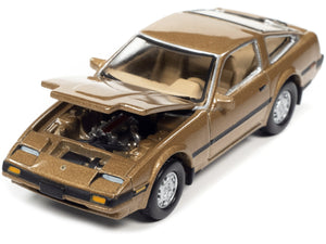 1984 Nissan 300ZX Aspen Gold Metallic with Black Stripes "Classic Gold Collection" Series Limited Edition to 12480 pieces Worldwide 1/64 Diecast Model Car by Johnny Lightning - Premium Nissan Models from Johnny Lightning - Just $23.99! Shop now at Rapidvehicles