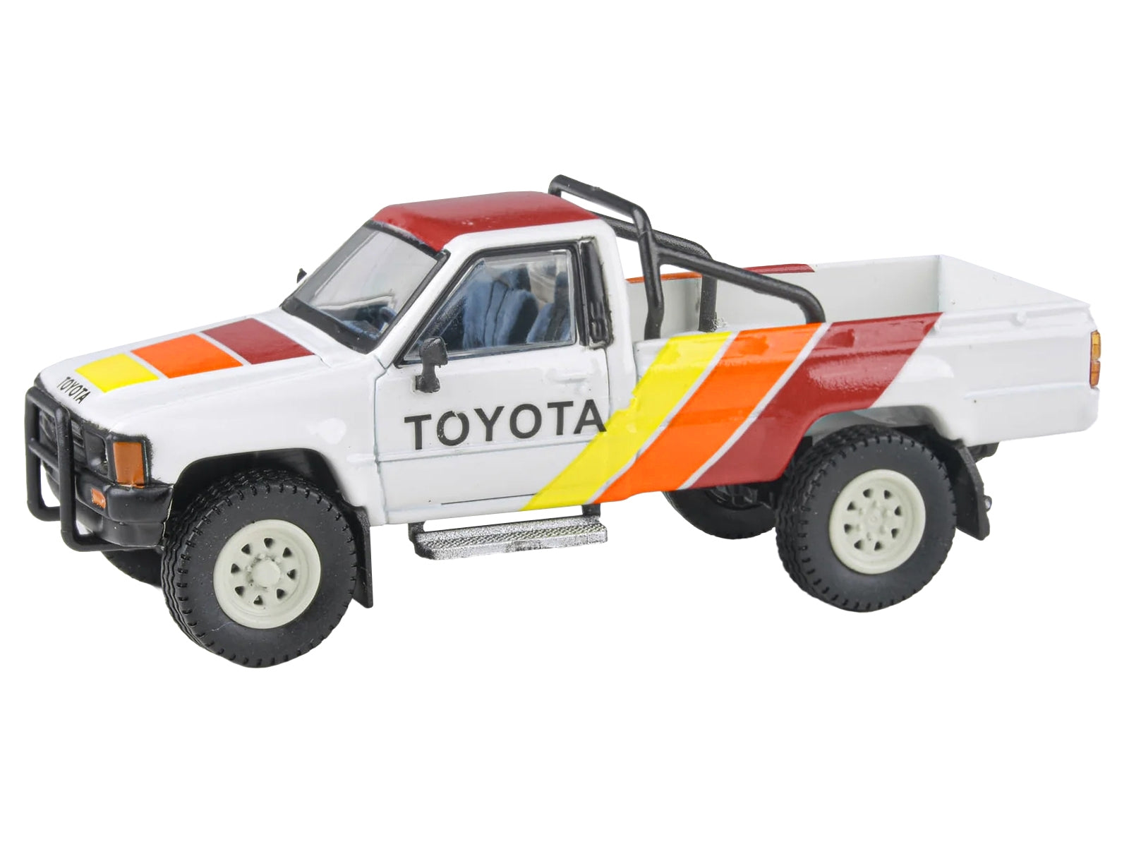 1984 Toyota Hilux Pickup Truck White with Stripes "TRD Ironman" 1/64 Diecast Model Car by Paragon Models - Premium Pickup Trucks Models from Paragon - Just $37.19! Shop now at Rapidvehicles