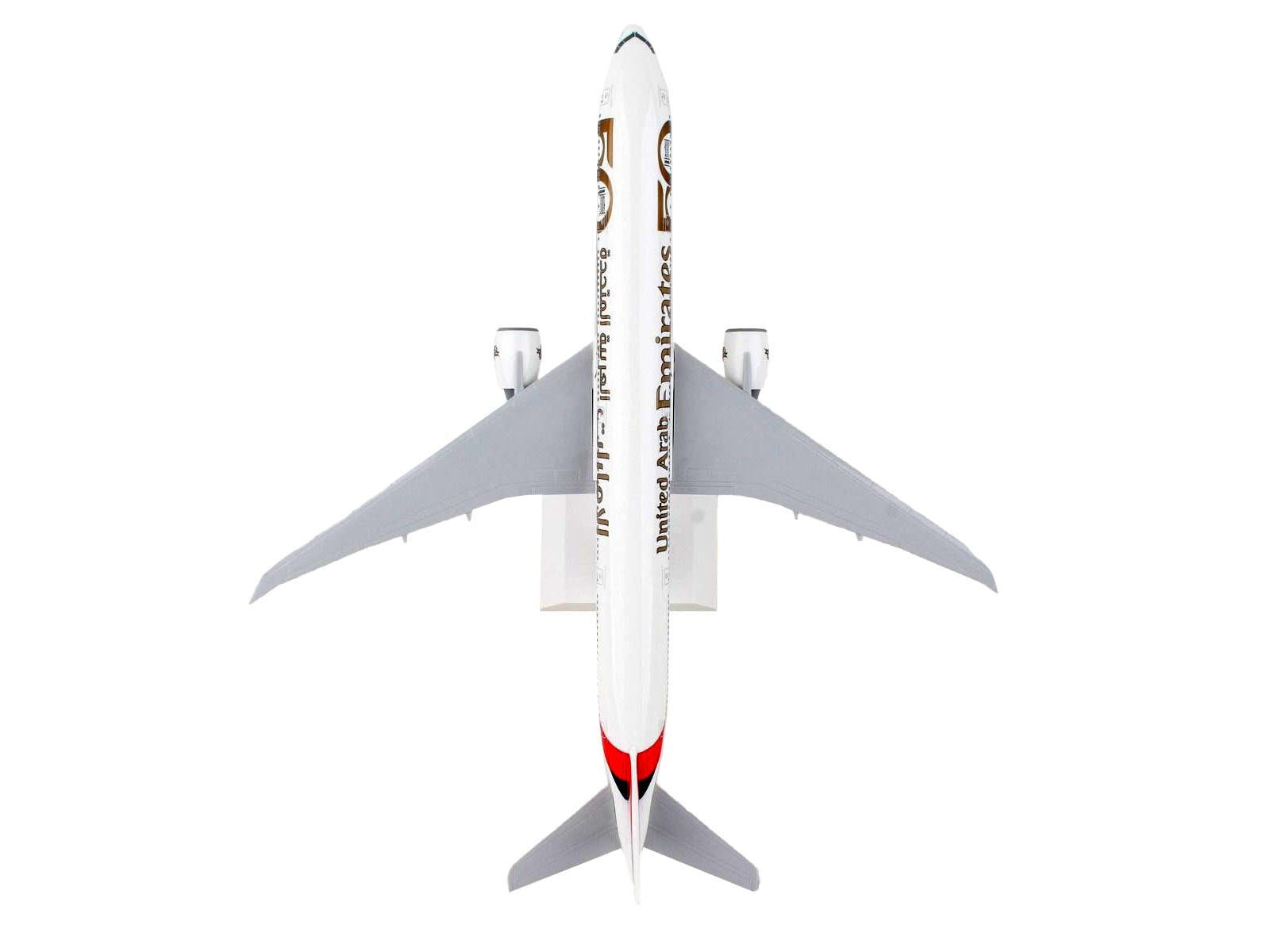 Boeing 777-300ER Commercial Aircraft with Landing Gear "Emirates Airlines - 50th Anniversary" (A6-EPO) White with Tail Graphics (Snap-Fit) 1/200 Plastic Model by Skymarks - Premium Boeing from Skymarks - Just $100.99! Shop now at Rapidvehicles