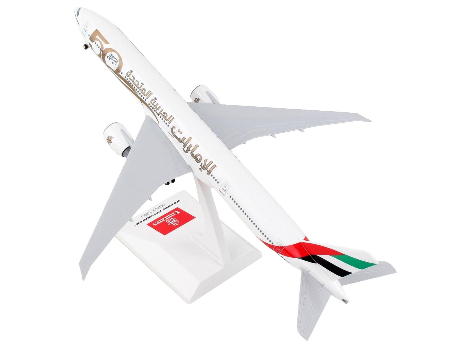 Boeing 777-300ER Commercial Aircraft with Landing Gear "Emirates Airlines - 50th Anniversary" (A6-EPO) White with Tail Graphics (Snap-Fit) 1/200 Plastic Model by Skymarks - Premium Boeing from Skymarks - Just $100.99! Shop now at Rapidvehicles