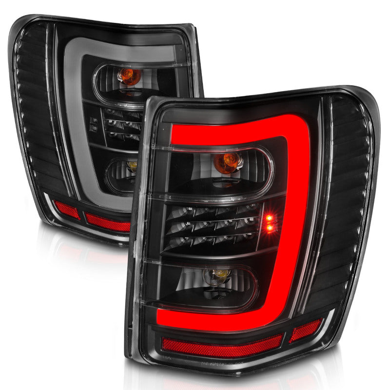 ANZO 1999-2004 Jeep Grand Cherokee LED Tail Lights w/ Light Bar Black Housing Clear Lens 311394