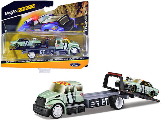 International DuraStar Flatbed Truck 17 and 1988 Ford Mustang LX 17 Light Green Metallic with Stripes and Graphics "Elite Transport" Series 1/64 Diecast Models by Maisto free shipping USA - Rapid Vehicles