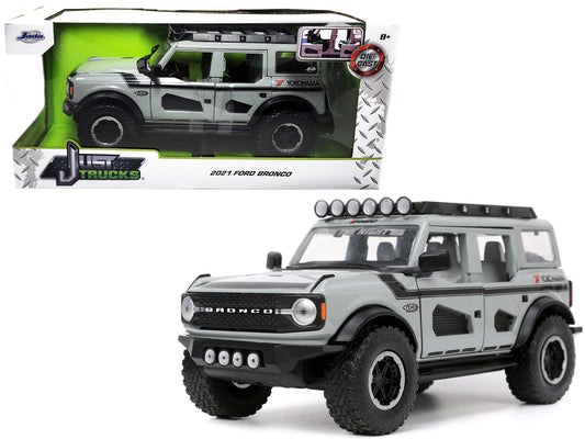 2021 Ford Bronco Gray with Black Stripes with Roof Rack "Own the Night" "Just Trucks" Series 1/24 Diecast Model Car by Jada free shipping USA