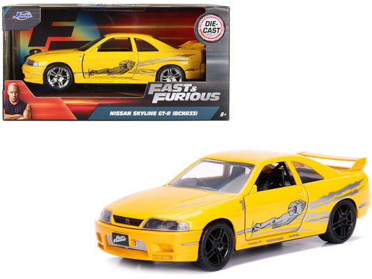 Leon's Nissan Skyline GT - R (BCNR33) Yellow Metallic with Graphics "Fast & Furious" Series 1/32 Diecast Model Car by Jada free shipping USA - Rapid Vehicles