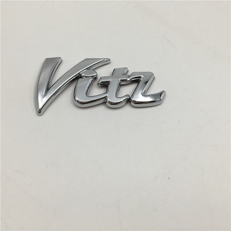 Color: silver - For Toyota Vitz Chrome Emblem Hatchback Badge - Premium Car Stickers from Rapidvehicles - Just $26.99! Shop now at Rapidvehicles