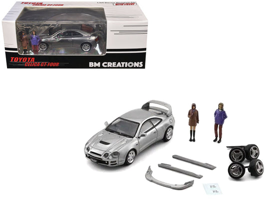 Toyota Celica GT - Four RHD (Right Hand Drive) ID Silver Metallic with 2 Figures and Accessories 1/64 Diecast Model Car by BM Creations free shipping USA - Rapid Vehicles