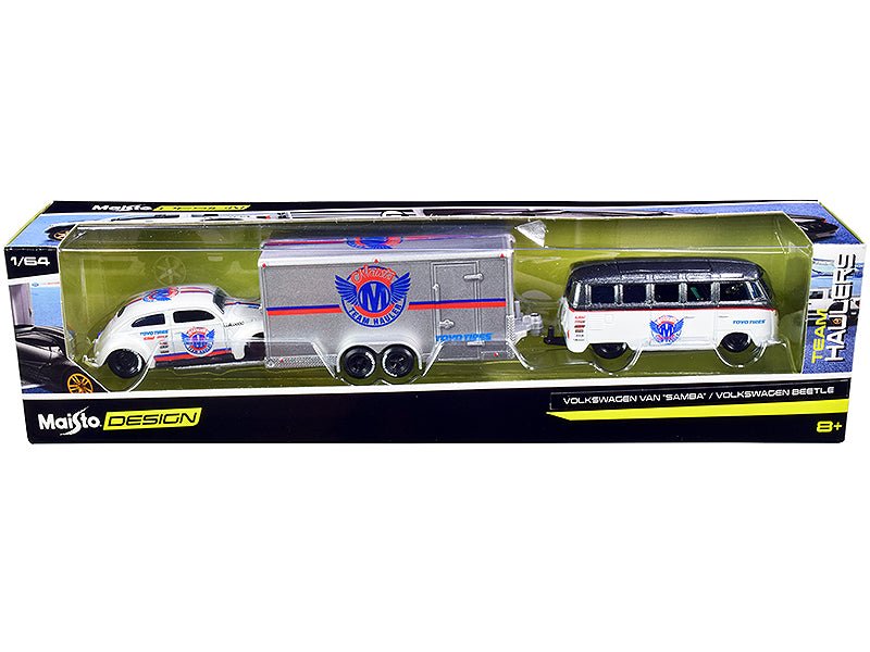 Volkswagen Samba Bus Dark Gray Metallic and White with Volkswagen Beetle White Metallic and Enclosed Car Trailer Silver "Toyo Tires" "Team Haulers" Series 1/64 Diecast Model Cars by Maisto free shipping USA - Rapid Vehicles